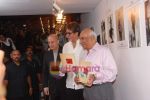 Amitabh Bachchan, Anupam Kher, Yash Chopra at Anupam Kher_s art exhibition in Bandra on 7th Sept 2010 (2).JPG